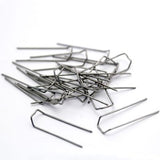 This image shows a group of mossing pins against a white backgroundMossing Pins, 3cm, per pack