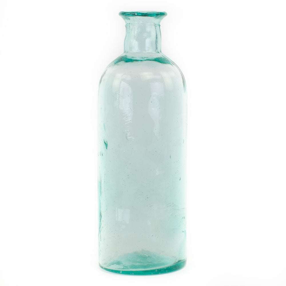 a blue/green glass bottle with an intentionally imperfect finish, showing air bubbles within the glass, and a slightly distorted finish
