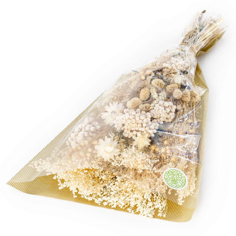 a bouquet made up with a selection of different flowers with an ecru theme