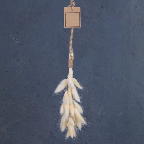 Bleached White lagurus formed into a little hanging decoration.
