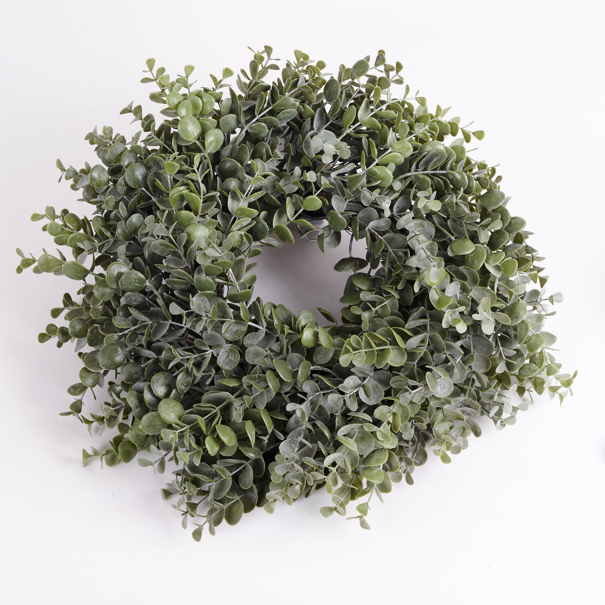 Wreath made with sprigs of artificial Eucalyptus Baby Blue. Spiralled to give an attractive finish to the wreath