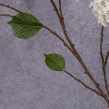 A close up of a faux hydrangea showing leaf detail