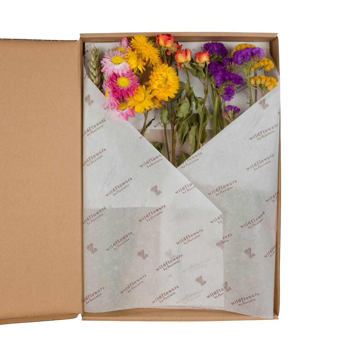 A box of Floriëtte bouquets in brown paper wrapping