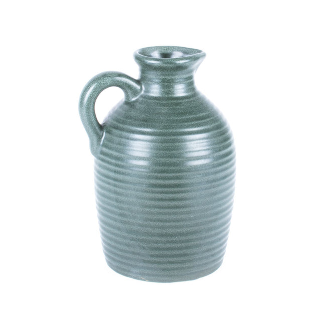 Our terracotta carafe looks stunning in a muted, old-green colour. It has a ridged pattern across the whole piece and a petite handle. 