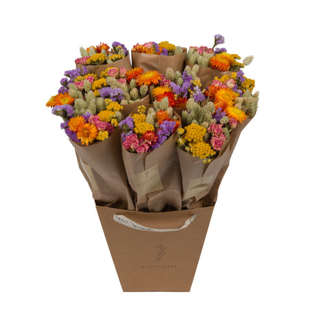 A bucket Floriëtte bouquets in brown paper