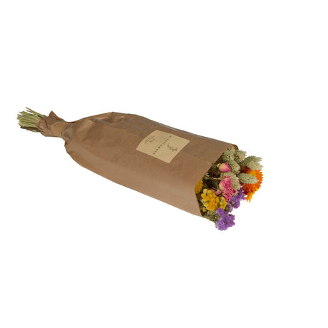 A bucket Floriëtte bouquets in brown paper