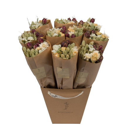 A bucket Floriëtte bouquets in brown paper