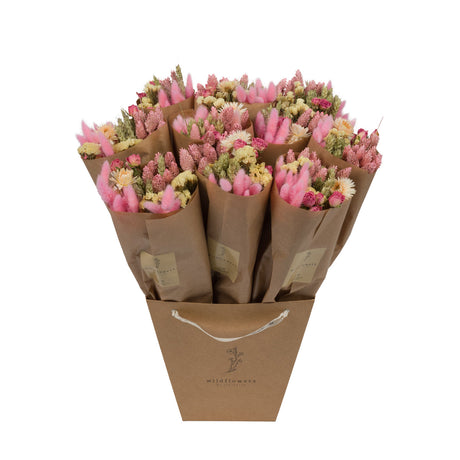 A bucket Floriëtte bouquets in brown paper
