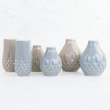 A group of 6 vases in 3 different styles and 2 alternative colours