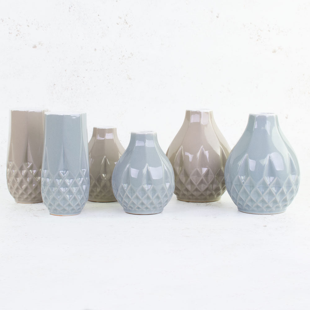 A group of 6 vases in 3 different styles and 2 alternative colours