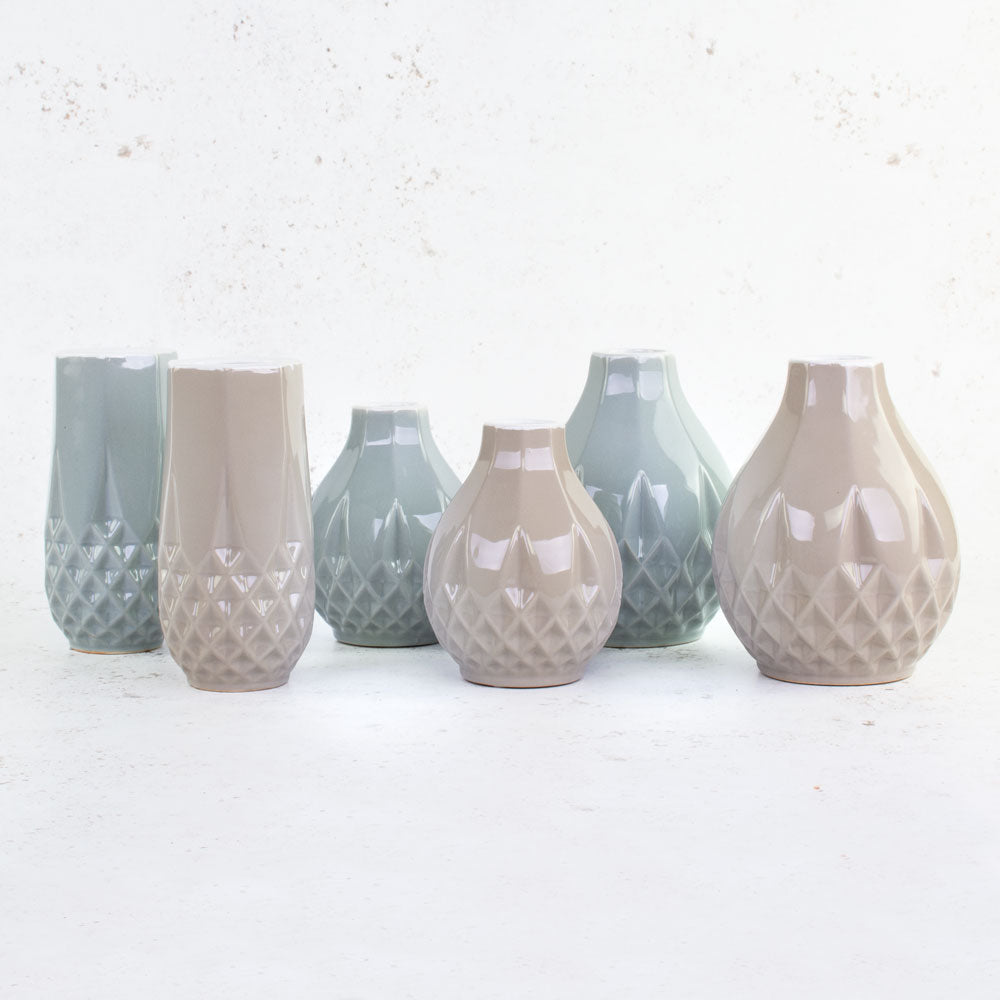 A group of 6 vases in 3 different styles and 2 alternative colours