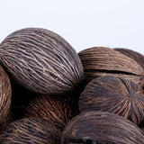 This image shows a bowl full of Mintolla balls set against a white background