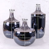 Trio of black vases