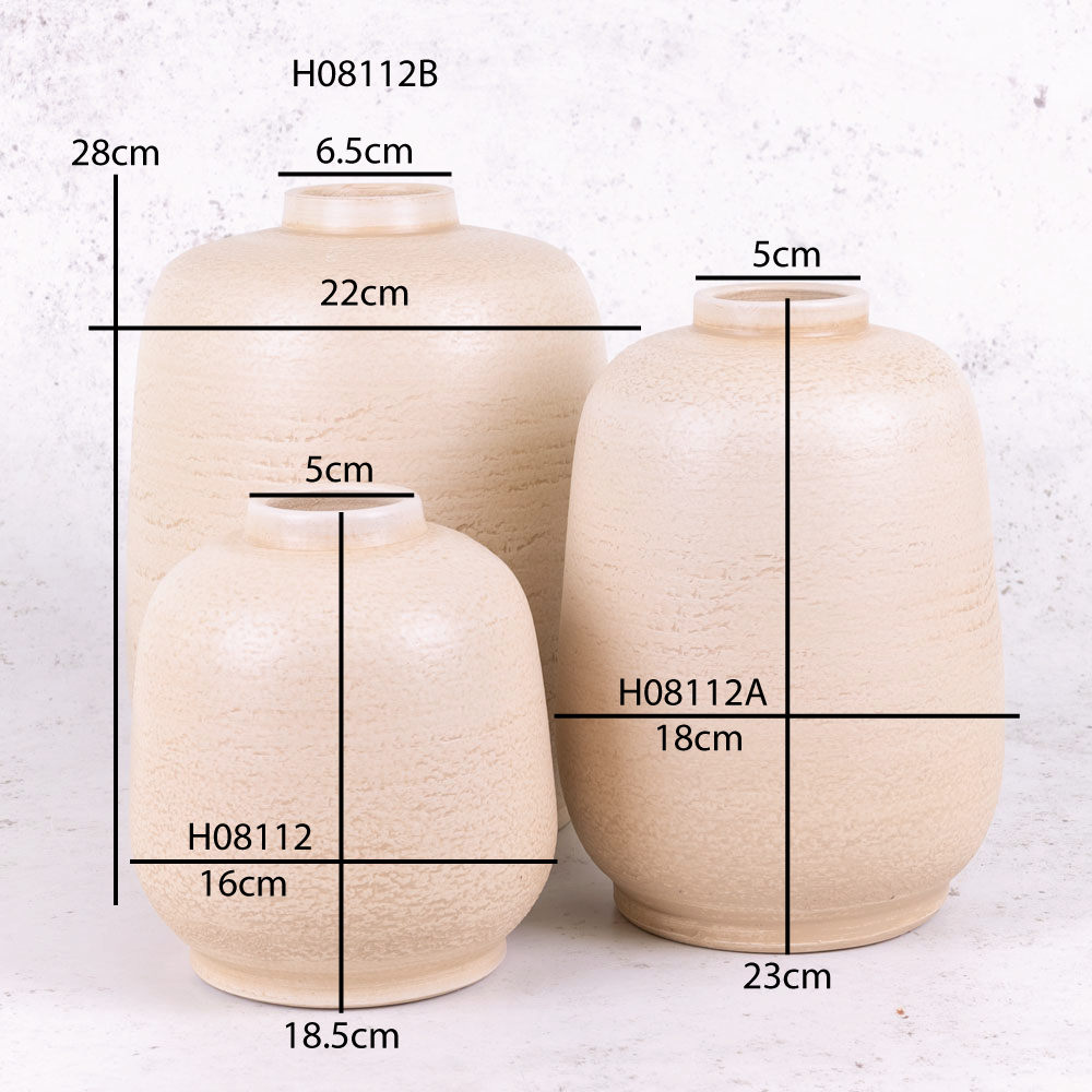 A group of pale beige vases of different heights and widths