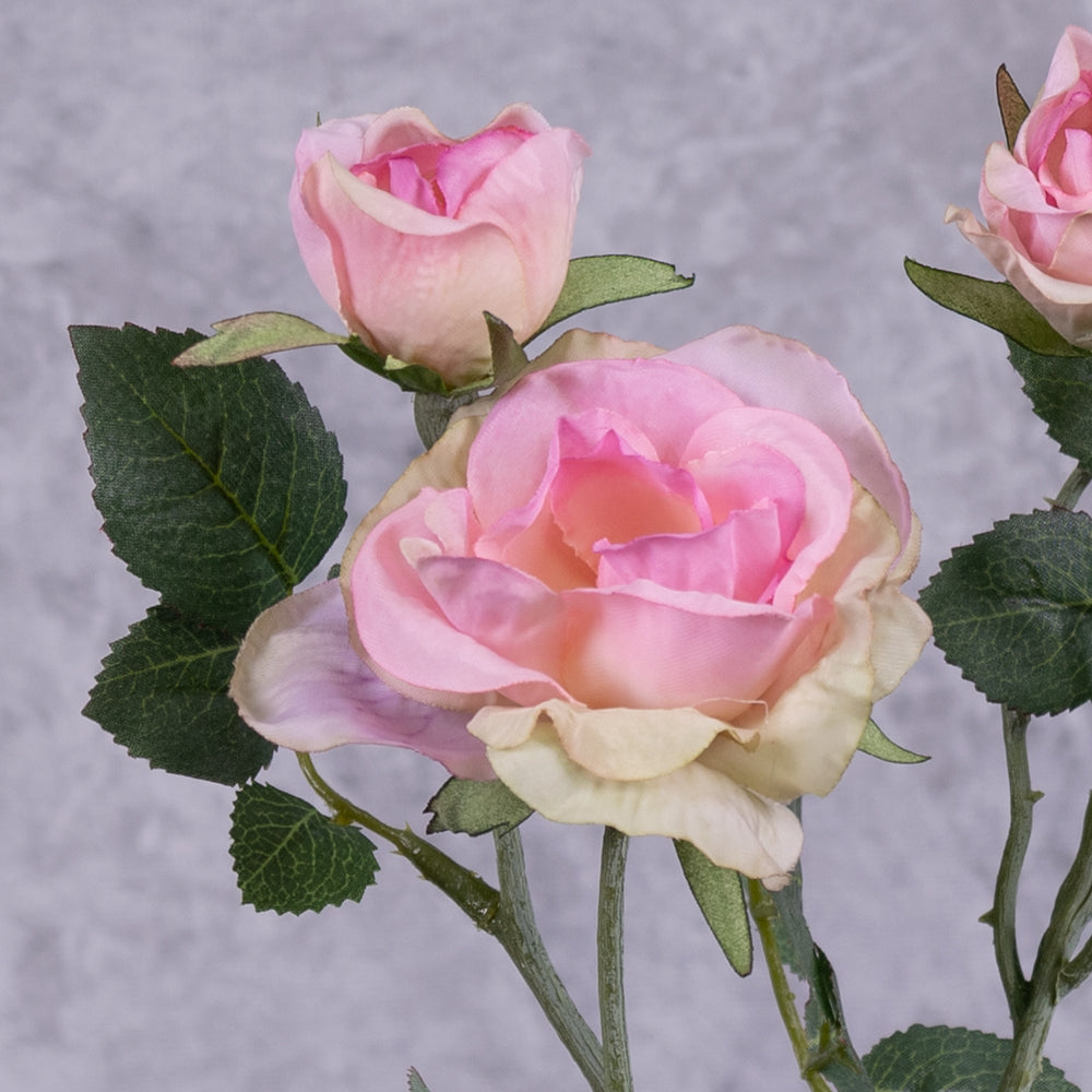 The close up of a faux pink rose