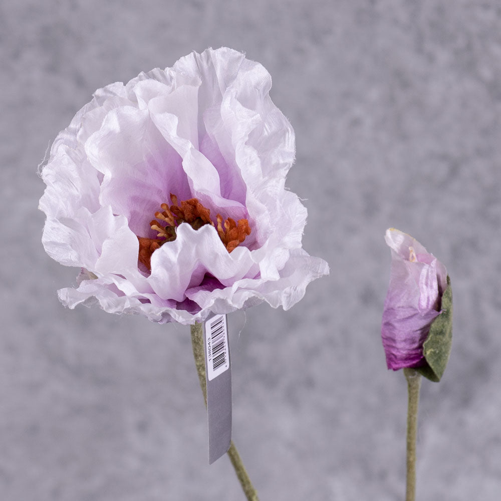 A faux poppy stem with an open flower and a budding flower on two branchlets. The flowers are a pale lavender colour that gets darker toward the centre of the flower