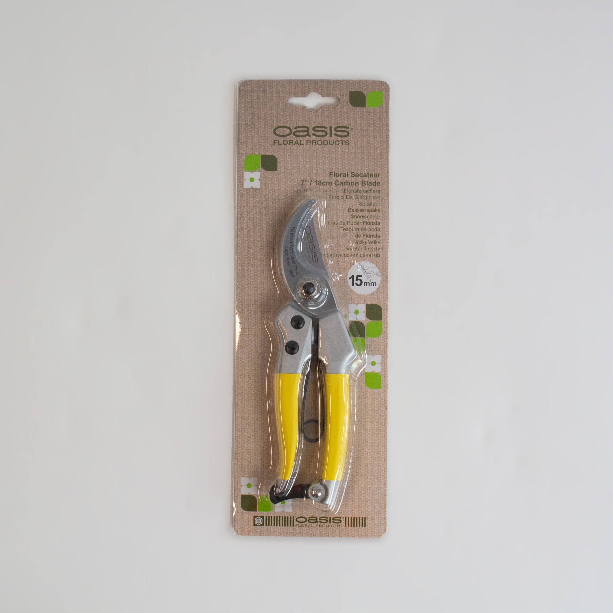 This image shows a set of Carbon Steel Secateurs in packaging, laid on a white background.