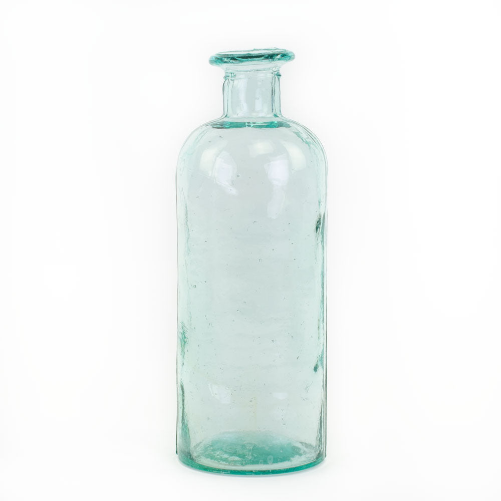 a blue/green glass bottle with an intentionally imperfect finish, showing air bubbles within the glass, and a slightly distorted finish