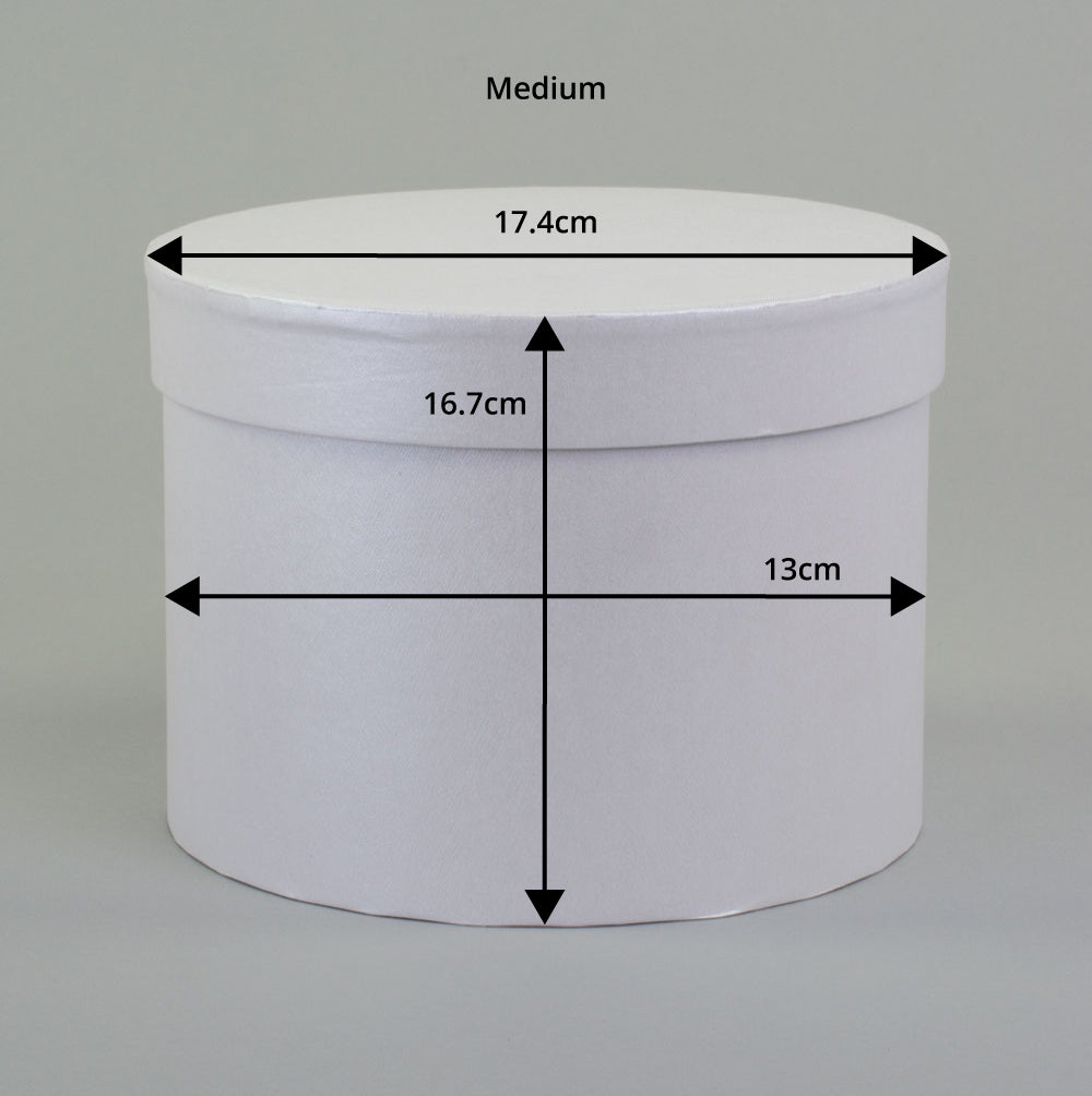 a white hat box showing dimensions
