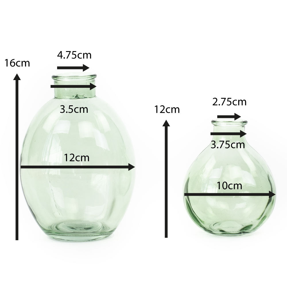 a pair of light green vases in two different heights