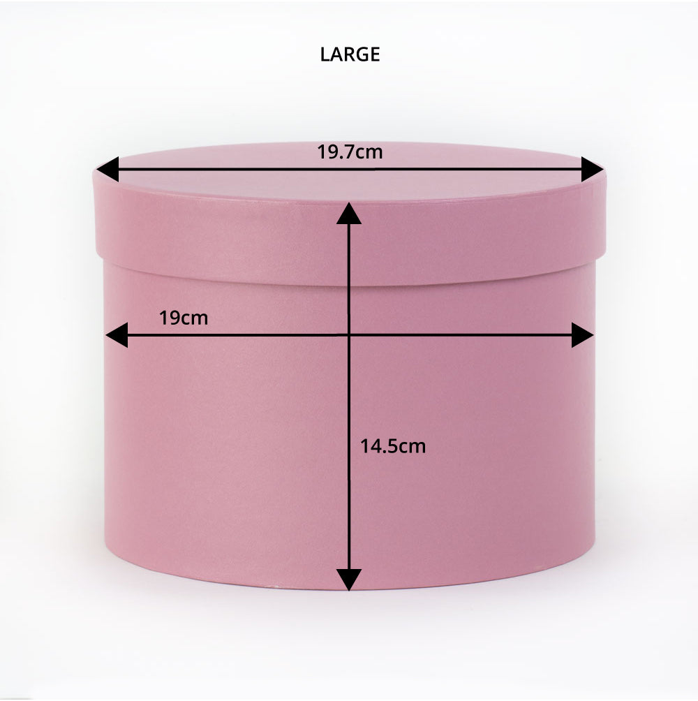 a baby pink hat box showing dimensions