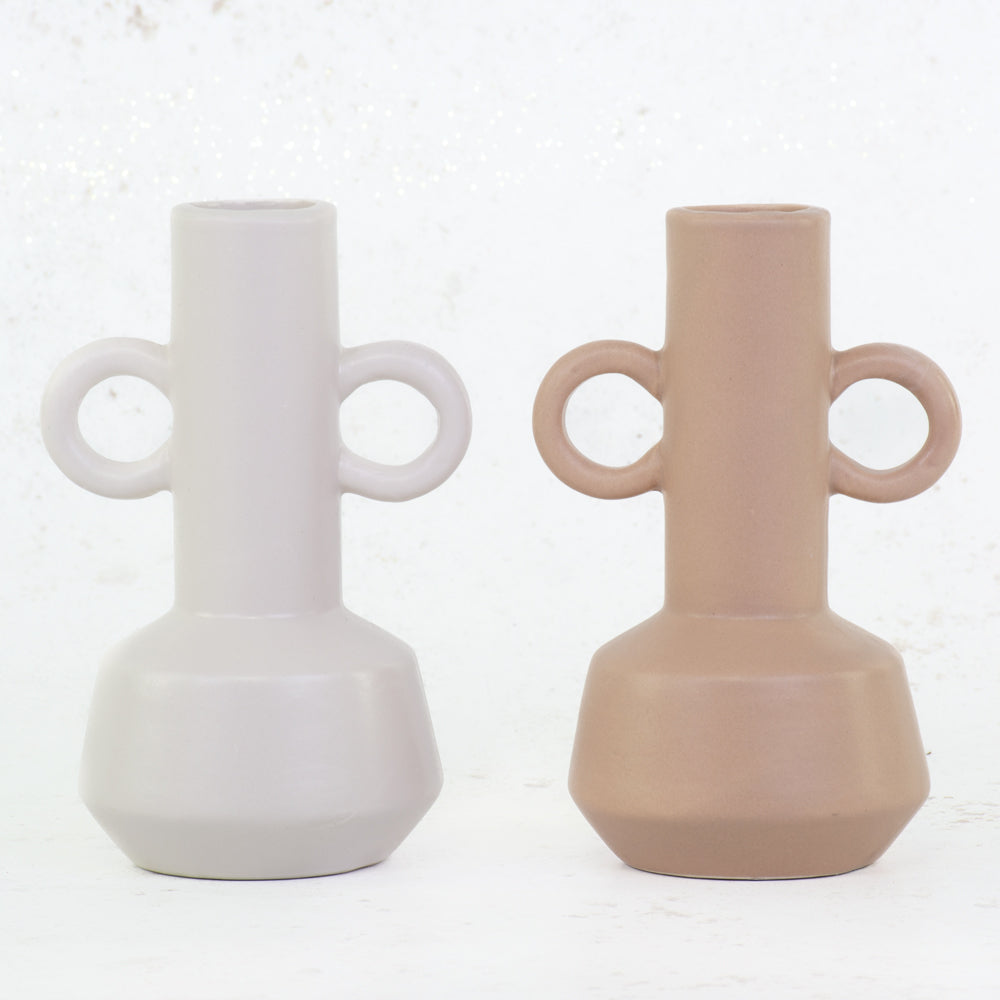 A pair of white and terracotta bud vases
