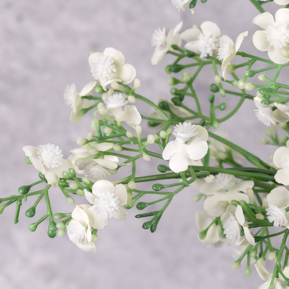 A faux gypsophila sprig