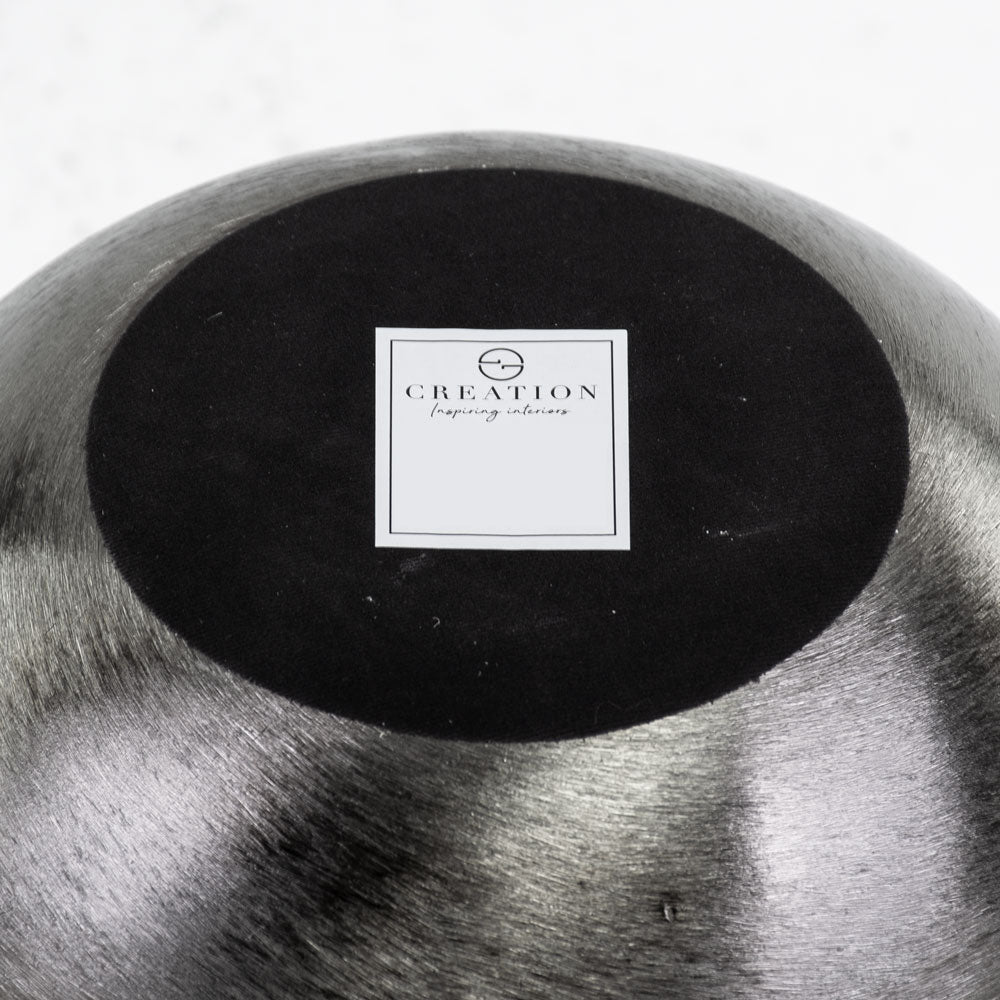 Black brushed metal pot cover base.
