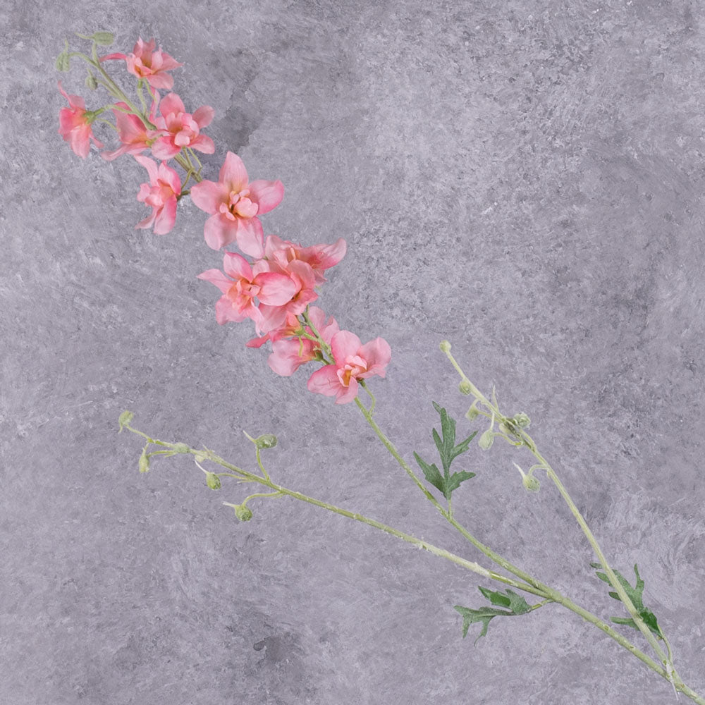 A tall faux delphinium with pink flowers