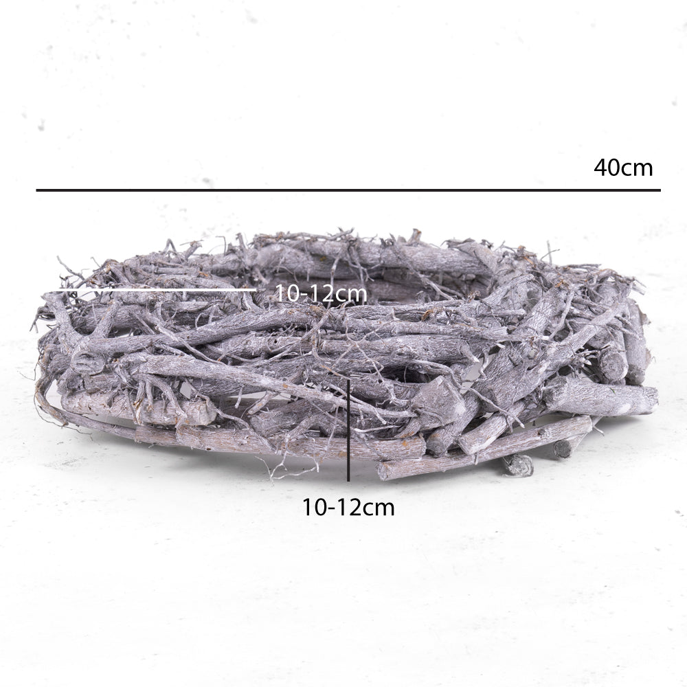 A chunky, grey wreath made from natural root twigs